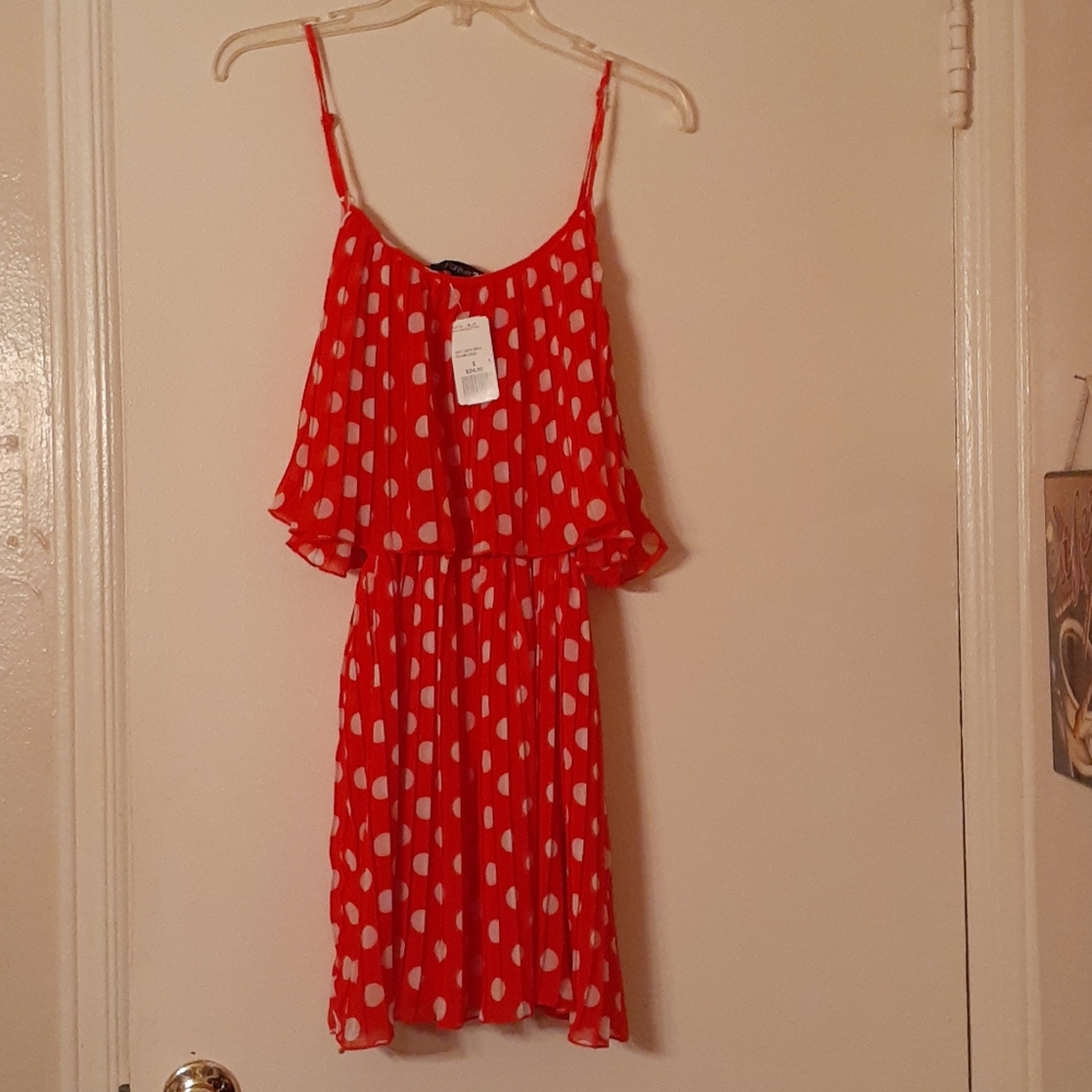 Salmon red polka dot dress.